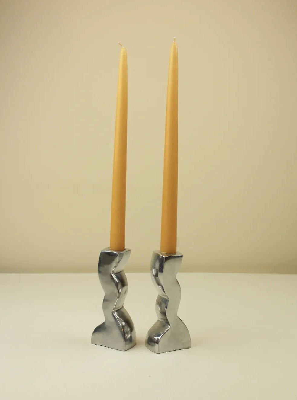 Beautiful and unique wavy metal candleholder with modern design and elegant curves