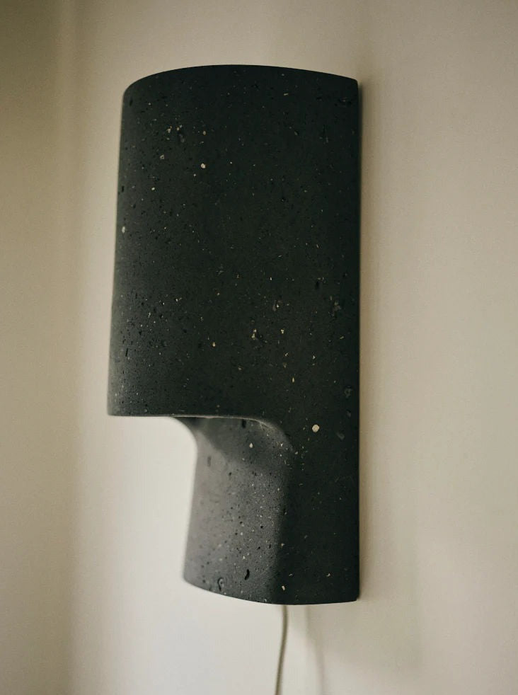 Modern anthracite wall light with sleek design and indirect lighting