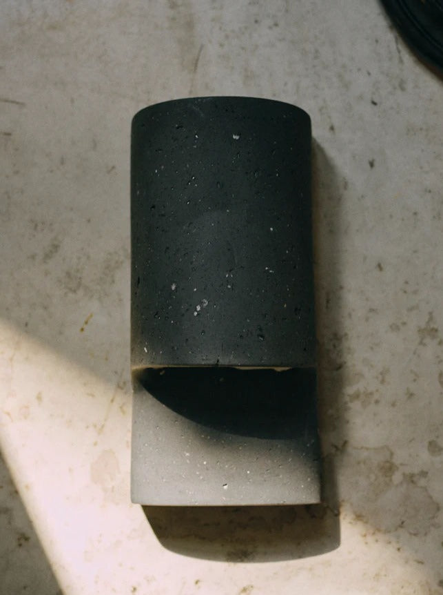 Modern anthracite Bien Wall Light with sleek design and warm illumination