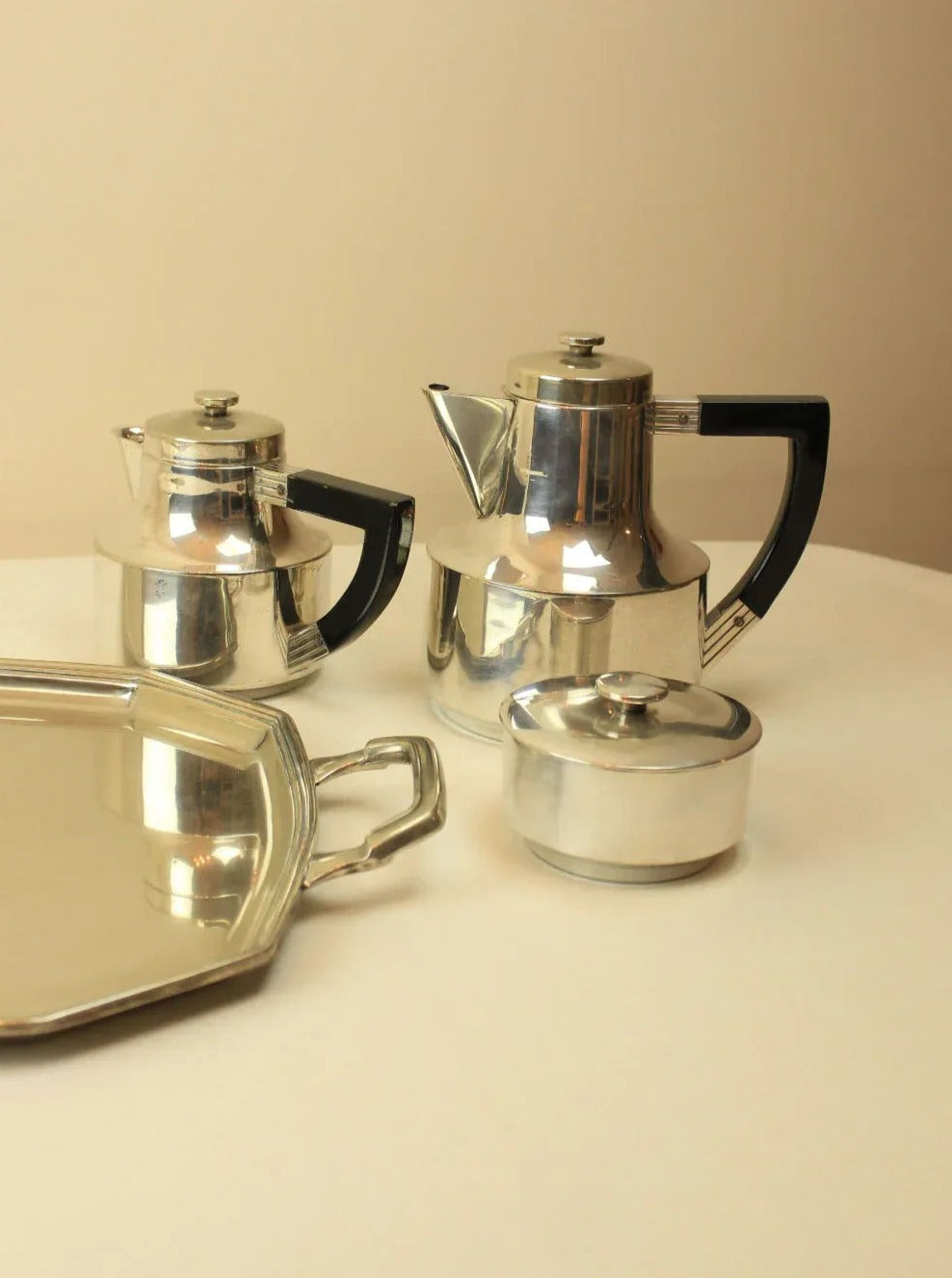 Beautiful and elegant Art Deco Coffee and Tea Set with intricate design and luxurious gold accents