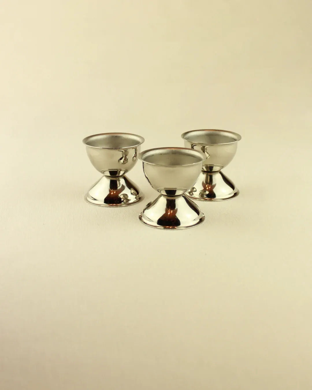 Alt text: Stainless steel Inox Egg Cups Set, stylish and durable breakfast accessory