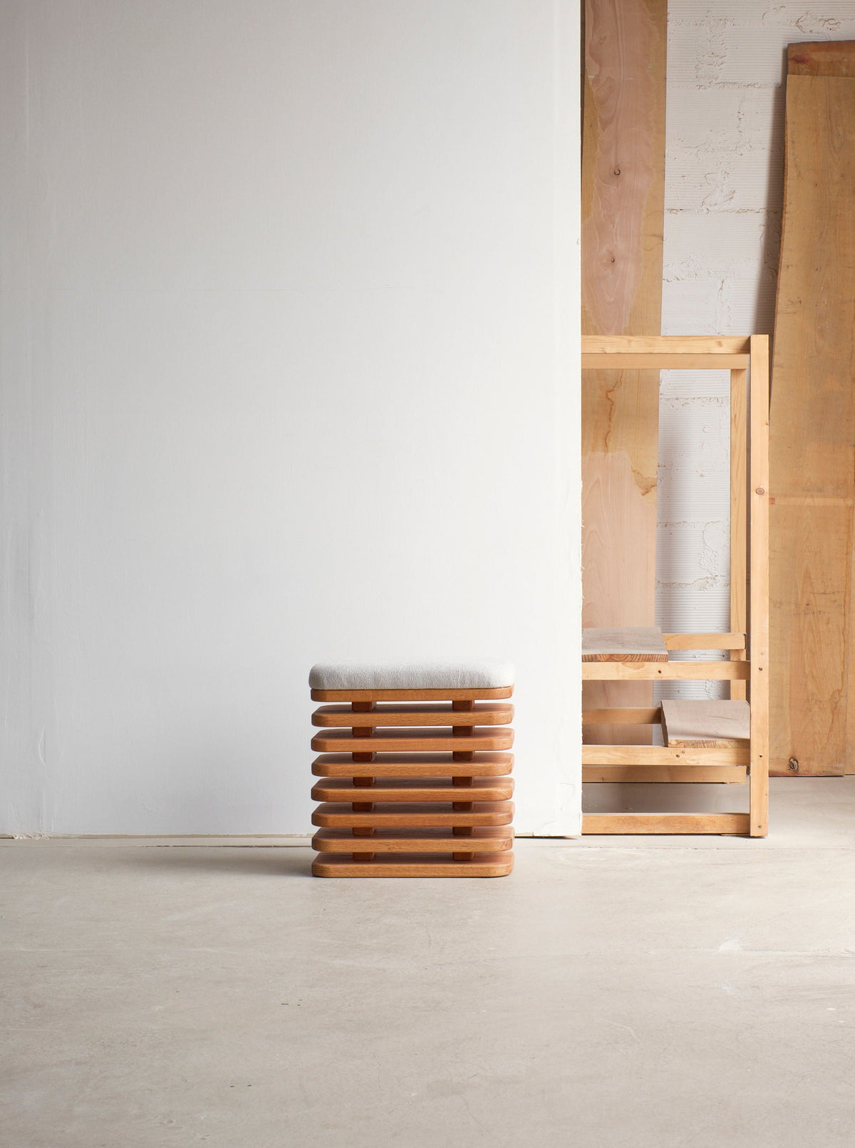 Minimalist Ushigome-Yanagichio stool made from sturdy wood and rattan weave
