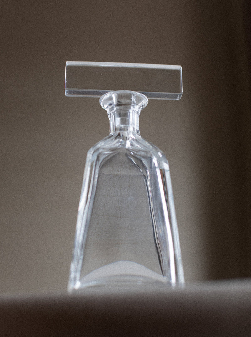 Elegant glass decanter with intricate etched design