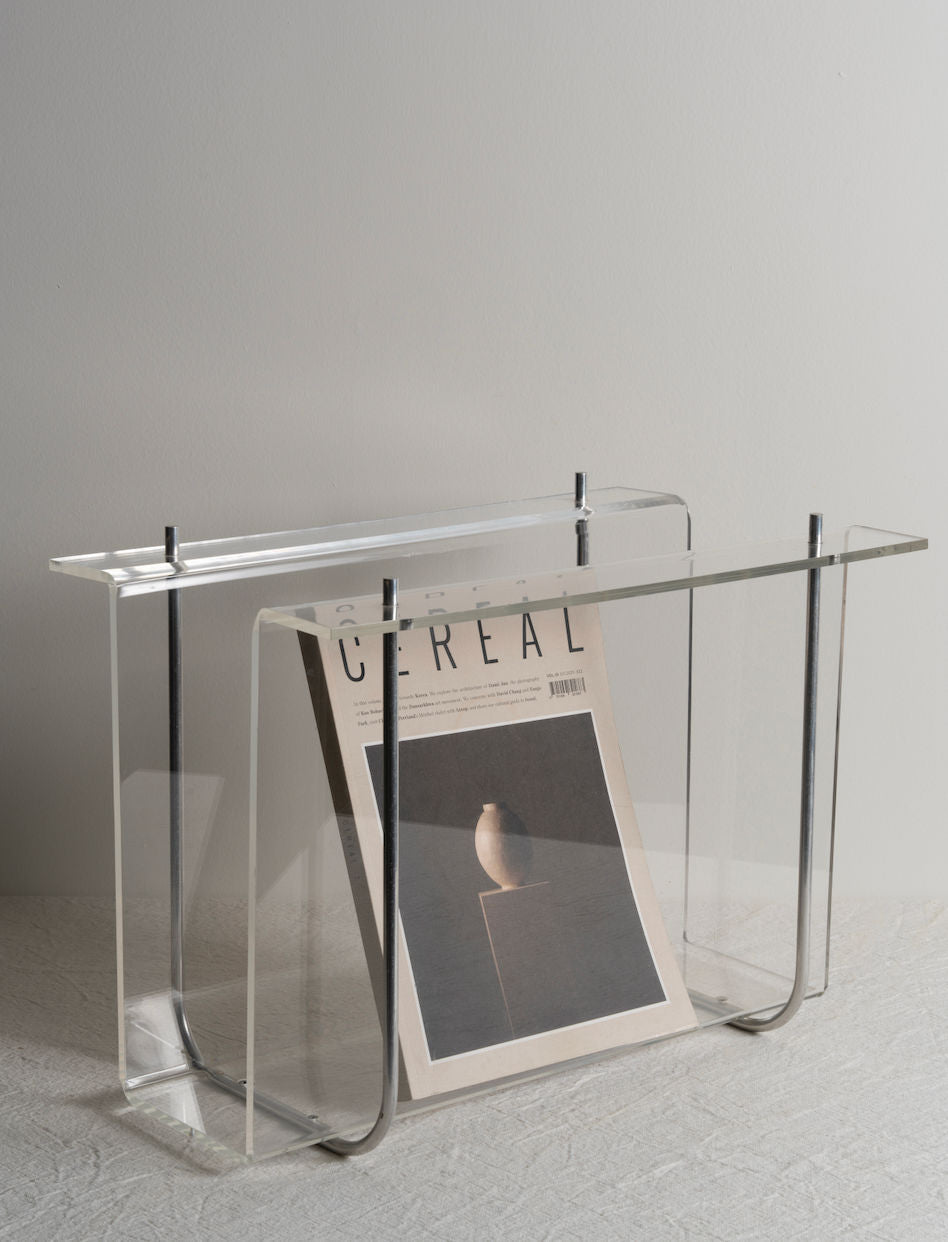 A modern and stylish Plexi Magazine Rack in clear acrylic material