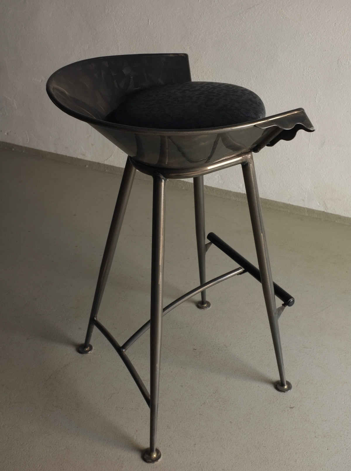Vintage set of 2 Brutalist cast metal bar stools from the 1980s, featuring a unique and industrial design with a distressed finish